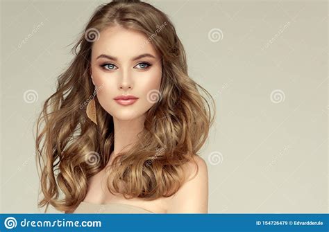 Young Blonde Haired Beautiful Model With Long Well Groomed Hair
