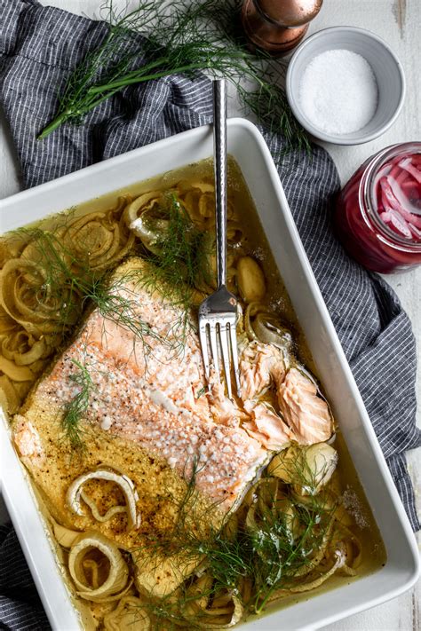 Olive Oil Slow Poached Salmon With Fennel And Lemon Arugula Herb Salad