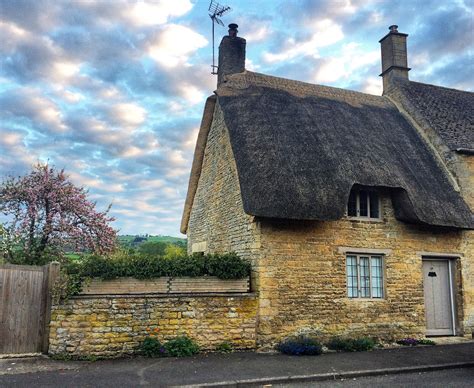 This Cozy Thatched Roof Cottage In A Tiny British Village Stole My