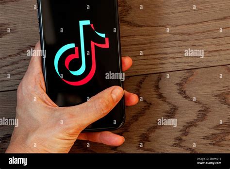 Tiktok Application Icon On Apple Iphone 11 Screen Close Up Hand