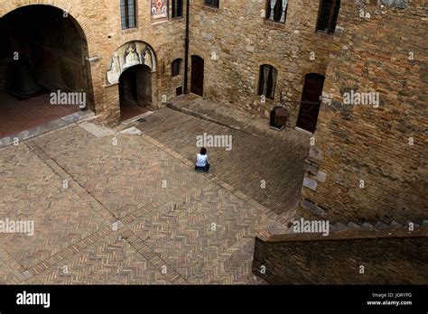 pretty courtyard in the palazzo del popolo taken from the loggia san gimignano province of