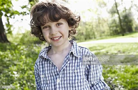 9 Years Old Boy With Long Hair Photos And Premium High Res Pictures