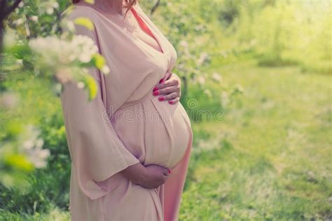 Pregnant Woman At The Office Talking On The Phone Stock Image Image