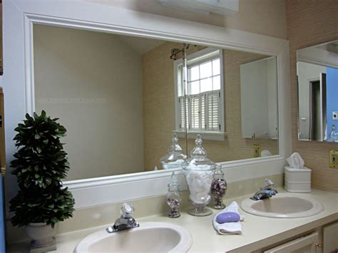 Our bathroom has two separate vanities with huge builder grade mirrors. How to Frame a Bathroom Mirror