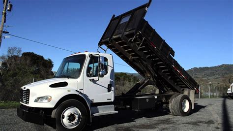 freightliner flatbed dump charter company truck