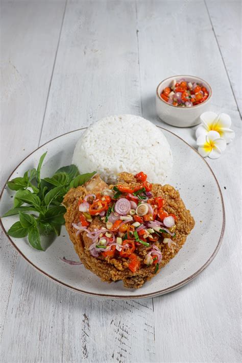 Premium Photo Ayam Geprek Sambal Matah Popular Street Food Dishes Of