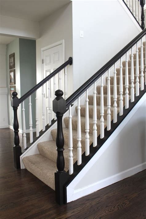 Choose the soft colors under the wooden pallet steps. PAINTING AN OAK BAINSTER | The Winthrop Chronicles | Staircase design, Home, New homes