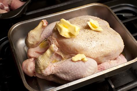 Uncooked Seasoned Chicken In A Roasting Pan Free Stock Image