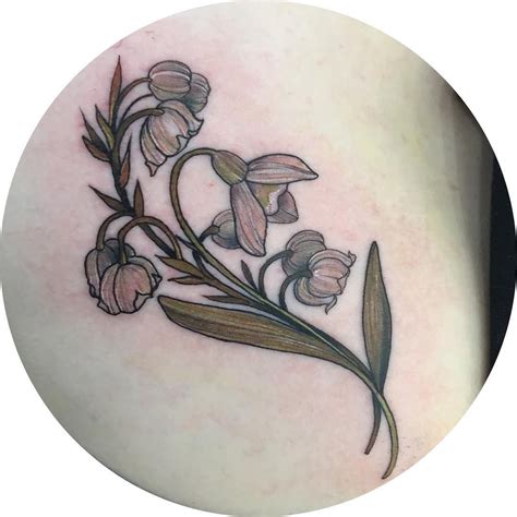 Please read the full application instructions before applying the tattoo. Simple Small Lily Of The Valley Tattoo