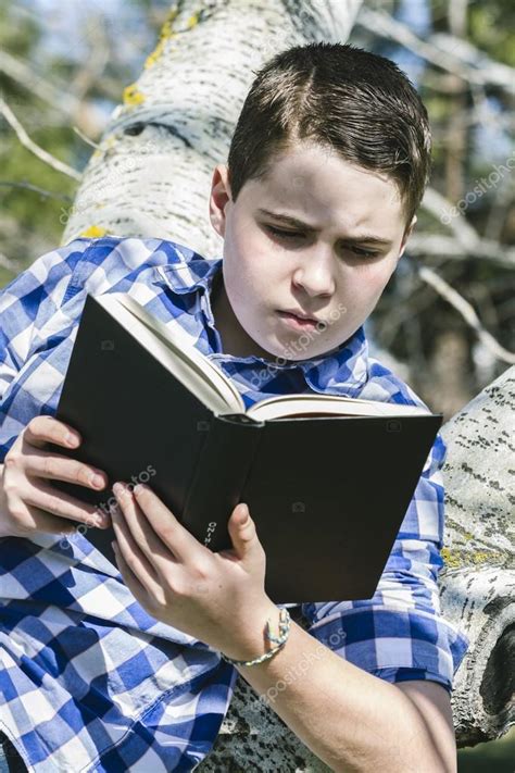 Boy Reading A Book Stock Photo By ©outsiderzone 91865644