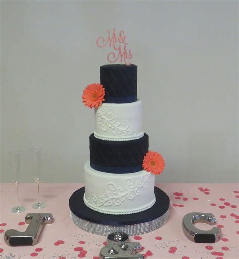 Navy Blue Coral And White Wedding Cake Decorated With Alternating