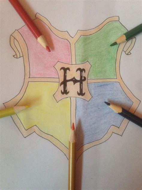 Simple and easy to draw Hogwarts emblem | Harry potter art ... How to draw newt scamander from harry potter.