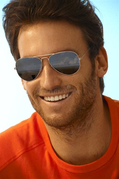 Portrait Of Happy Handsome Man Wearing Sunglasses Stock Photo Image