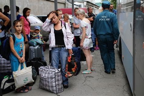 Thousands Of Ukrainian Refugees Flee To Russia For An Uncertain Future Wsj