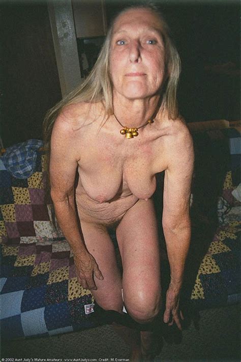 Granny Poses Naked And Shows Her Old Hairy Pussy