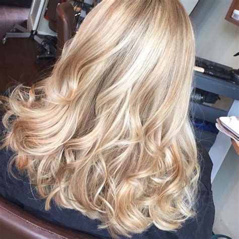 Full Head Of Champagne And Soft Blonde Woven High Lights Balayage