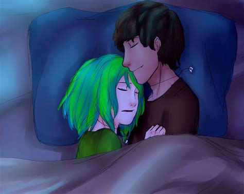 A Man And Woman Laying In Bed With Green Hair