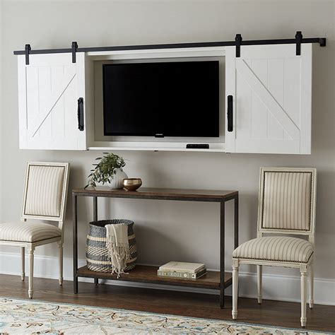 Hanging your tv can be a daunting task and figuring out what to do with the cables can be a nightmare. Barn Door TV Wall Cabinet | Ballard Designs