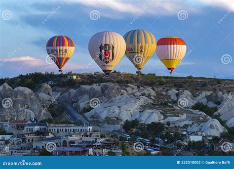 Hot Air Balloons Fly Over The City Of Goreme Editorial Photography