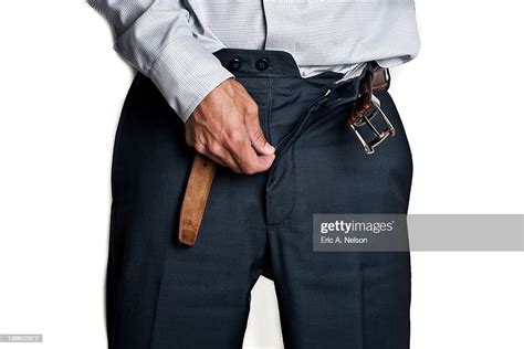 Man Zipping His Pants Photo Getty Images