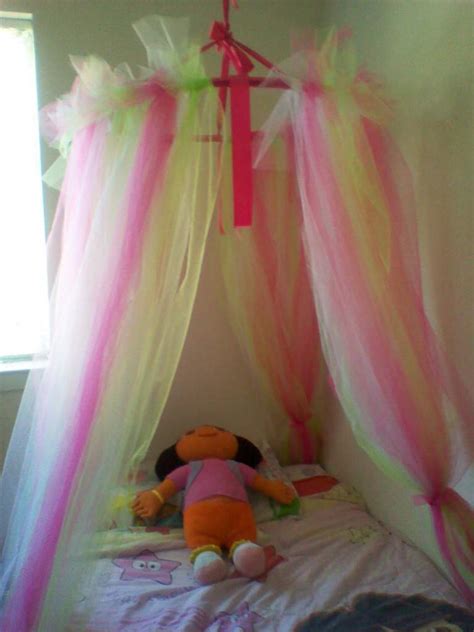 This homemade bed canopy is not only an easy bedroom decor idea, it adds a great focal point and adds a wisp of dreaminess to a. Princess Dazzle: How to make a tulle bed canopy!