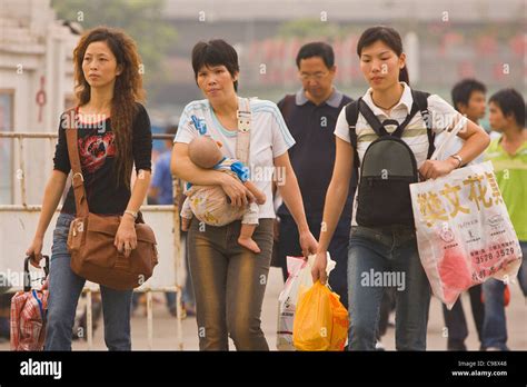 Guangzhou Guangdong Province China Passengers Arriving At Train