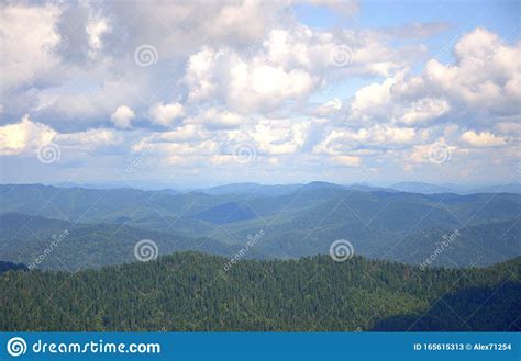 A Picturesque View Of The Tops Of Mountain Ranges Overgrown With