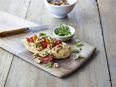 Stir fry the chicken in oil. Roasted Tomato Walnut Chicken - California Walnuts