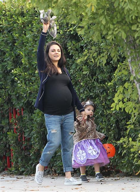 Ready To Pop Very Pregnant Mila Kunis And Ashton Kutcher Celebrate Halloween With Their Little