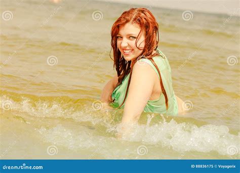 Redhead Woman Posing In Water During Summertime Stock Image Image Of