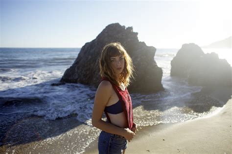 Wallpaper Sunlight Women Outdoors Model Sea Rock Shore Sand Brunette Looking At Viewer