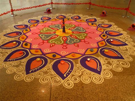 Kolam designs, is an embellishing form of art, a sand painting made using rice powder by women mainly in south india. Kolam and Rangoli | Deepavali