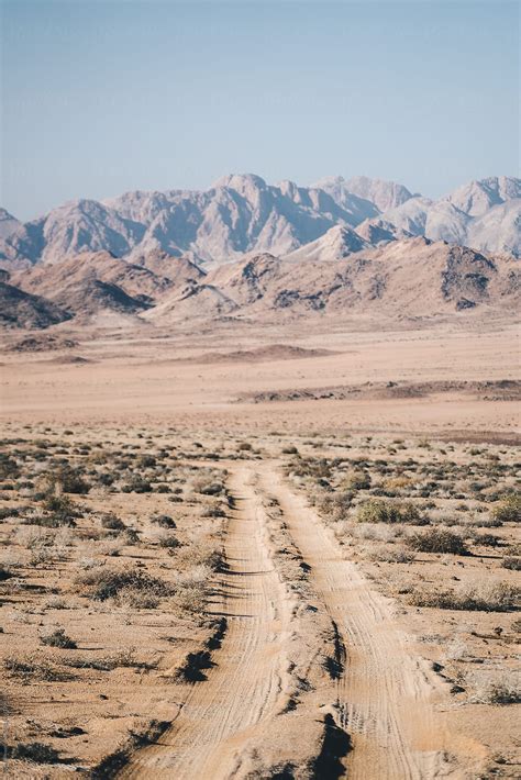 Empty Dirt Road Track By Stocksy Contributor Juno Stocksy