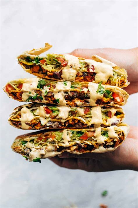No need to go to taco bell when you can make these loaded, vegan crunchwraps right at home! Vegan Crunchwrap Supreme Recipe - Pinch of Yum
