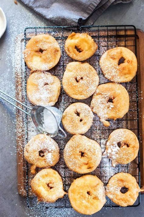 Soft and fluffy doughnut dough that is stuffed with fresh apple filling. Apple Ring Fritters (Apfelküchle) | Recipe in 2020 (With ...