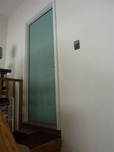 Greige paint colors are a great choice for the home. The door color is Benjamin Moore Grenada Villa. | Home ...