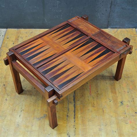 One is a fixed chess table and the other is a motorized chess table. Danish Teak Game Table Backgammon Chess at 1stdibs