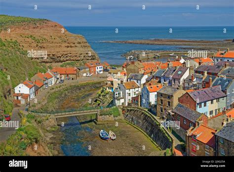 Staithes Village With Staithes Beck Flowing Towards The Harbour And The