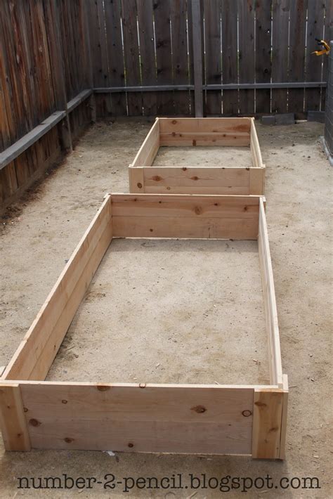 These raised garden beds with reclaimed wood and planks look ultra stylish and very this incredibly easy diy pallet container raised garden bed looks chic and is just right for a small kitchen garden. Build an Easy DIY Garden Fence - No. 2 Pencil