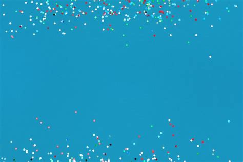 Colorful Confetti On Blue Background High Quality Holiday Stock