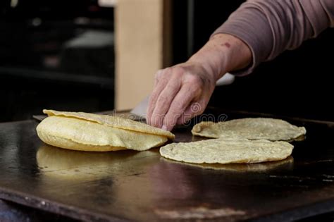 Mexican Fresh Corn Tortillas Being Cooked On A Traditional `comal