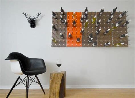 Beautiful storage in any area of your home. STACT: A Modular Wine Wall | Wine wall, Wall design, Wall ...