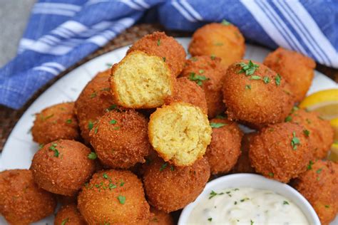 Hush puppies are a favorite part of southern cuisine and are traditionally served with fried catfish. Hush Puppies | Delicious Golden Fried Cornbread Recipe