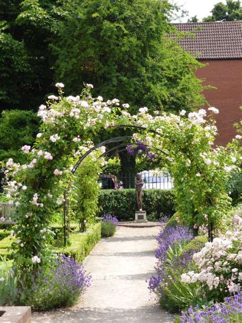 Accentuate the natural beauty of greenery with face garden planters from alibaba.com. 22. Victoria Garden statue with flowers - Farnham Town Council