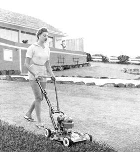The Mower Collection Woman Wearing Thongs Mowing Lawn In Vintage