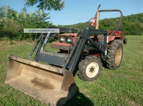 International 244 4wd Tractor With Loader
