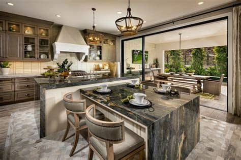 It's not uncommon to see large banks of cabinets taking up entire walls. 5 Double Island Kitchen Ideas for Your Custom Home