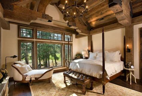 A traditional chandelier and rustic wood paneling work great in this 1920s log cabin. Home decor trends 2017: Rustic bedroom