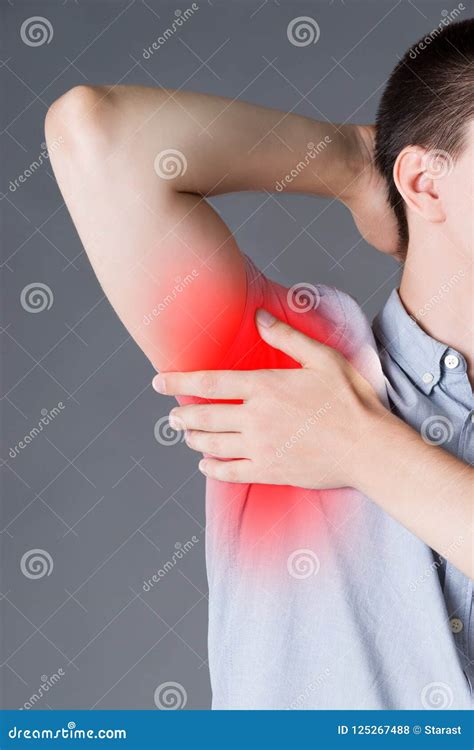 Man Suffering From Pain In Armpit Stock Photo Image Of Dermatology