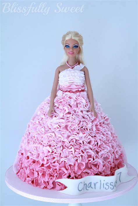 There are 1561 cake for barbie for sale on etsy, and they cost $10.27 on average. Blissfully Sweet: An Ombre Pink Ruffled Barbie Birthday Cake